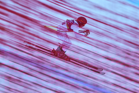 Slovakia's Rebeka Jancova speeds down the course during an alpine ski women's downhill training for a team combined race, at the 2026 Winter Olympics, in Cortina d'Ampezzo, Italy.