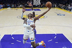 | Photo: AP/Jae C. Hong : Oklahoma City Thunder guard Jalen Williams (8) puts up a shot past Los Angeles Lakers center Deandre Ayton during an NBA basketball game in Los Angeles.