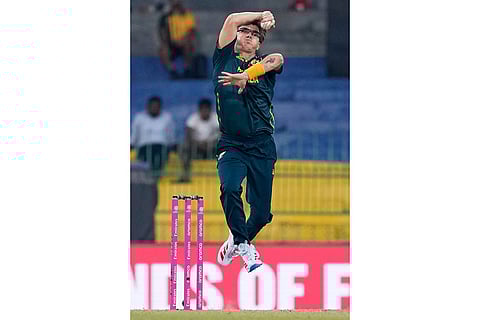 Australia's Adam Zampa bowls a delivery during the T20 World Cup cricket match between Australia and Ireland in Colombo, Sri Lanka.
