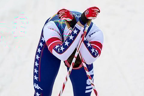 Julia Kern, of the United States reacts after crossing the finish line in a semifinal of the cross-country skiing women's sprint classic at the 2026 Winter Olympics, in Tesero, Italy.