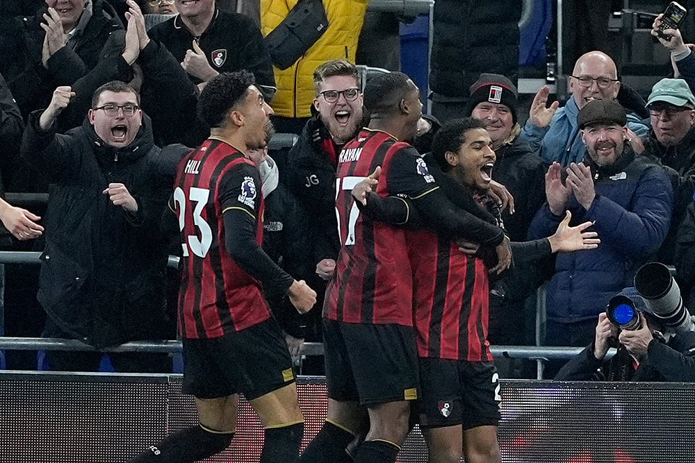 Bournemouth's Amine Adli, right, celebrates scoring their side's second goal of the game Everton during their English Premier League soccer match in Liverpool, England. - | Photo: Peter Byrne/PA via AP