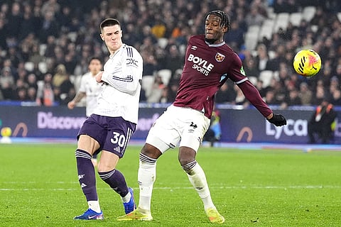 Manchester United's Benjamin Sesko (30) scores against West Ham United during a Premier League soccer match in London. 