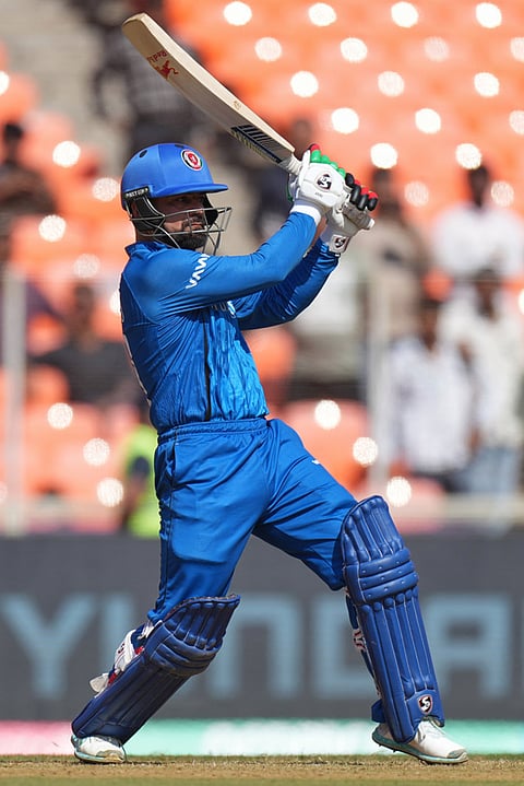 Afghanistan's captain Rashid Khan plays a shot during the T20 World Cup cricket match between Afghanistan and South Africa in Ahmedabad.