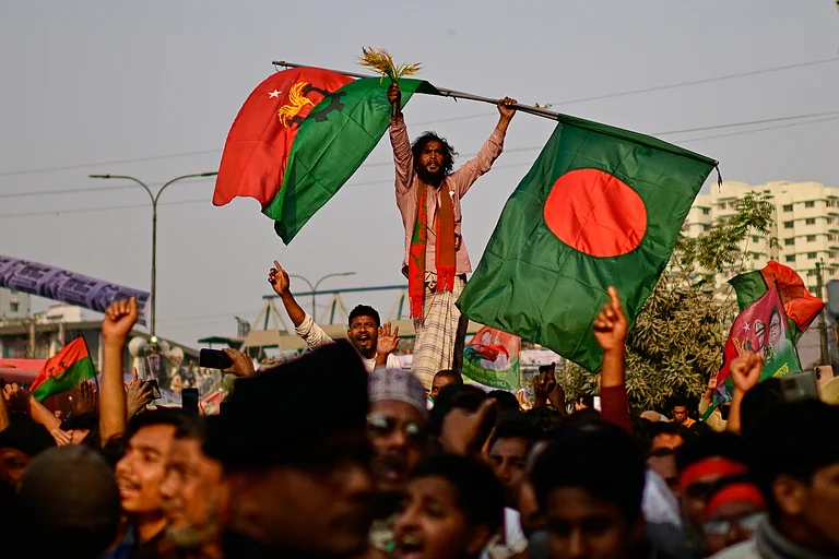 Supporters of Bangladesh Nationalist Party (BNP) cheer during an election rally of their party Chairperson Tarique Rahman in Dhaka, Bangladesh, Sunday, Feb. 8, 2026. - (AP Photo/Mahmud Hossain Opu)