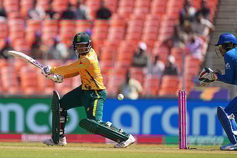South Africa's Quinton de Kock takes a shot during the T20 World Cup cricket match between Afghanistan and South Africa in Ahmedabad.