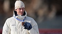 AP/Mosa'ab Elshamy : Sturla Holm Laegreid holds his bronze medal at the Winter Olympics 2026
