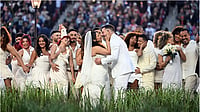 AFP : Performers portray a wedding during Puerto Rican singer Bad Bunny performance at Super Bowl 