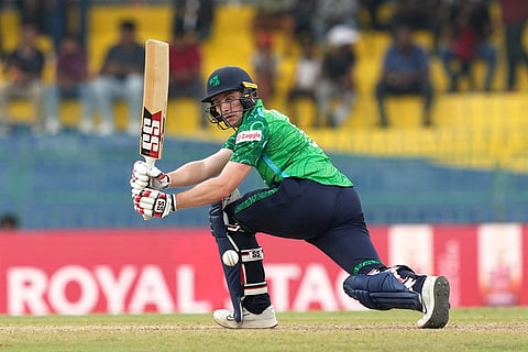 Ireland's Lorcan Tucker bats during the T20 World Cup cricket match between Australia and Ireland in Colombo, Sri Lanka.