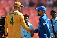 | Photo: AP/Ajit Solanki : Afghanistan's captain Rashid Khan and South Africa's captain Aiden Markram, left shake hand after the toss during the T20 World Cup cricket match between Afghanistan and South Africa in Ahmedabad.