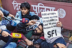 Photo: Tribhuvan Tiwari : Fair Demand: Delhi police detain an activist from the Students’ Federation of India during a protest in Delhi on February 5 demanding the immediate implementation of the UGC (Promotion of Equity in Higher Education Institutions) Regulations, 2026