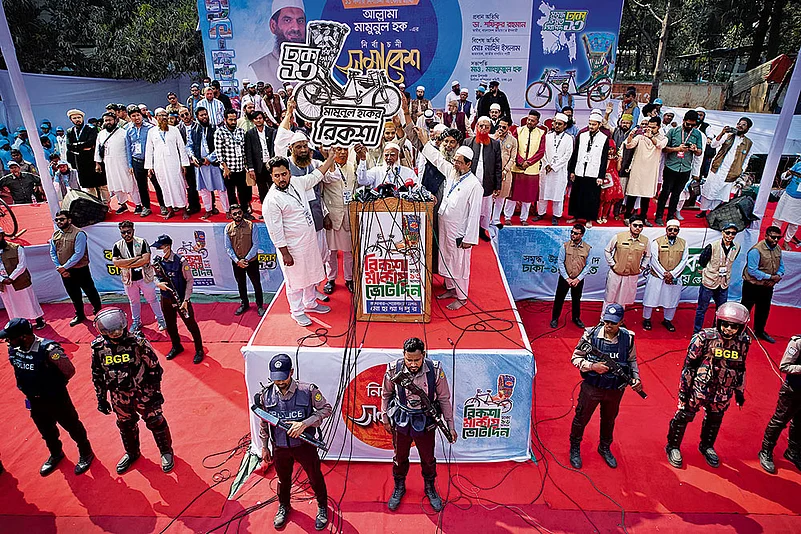 Jamaat-e-Islami leader Shafiqur Rahman (centre) at an election rally in Dhaka