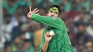 Photo: AP/Eranga Jayawardena : Pakistan's Usman Tariq bowls a delivery during the T20 World Cup cricket match between Pakistan and the United States in Colombo, Sri Lanka.