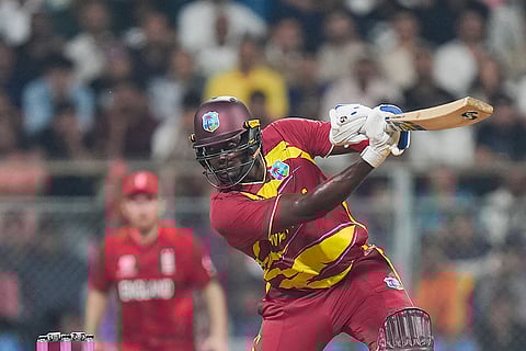 West Indies' Jason Holder plays a shot during an ICC Men's T20 World Cup 2026 cricket match between England and West Indies, at the Wankhede Stadium, in Mumbai, Maharashtra.