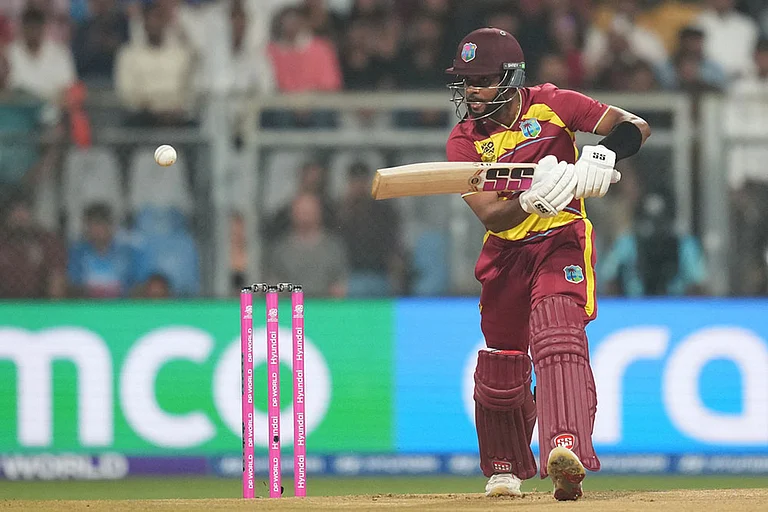 West Indies' Brandon King plays a shot during the T20 World Cup cricket match between England and West Indies in Mumbai, India. - | Photo: AP/Rafiq Maqbool