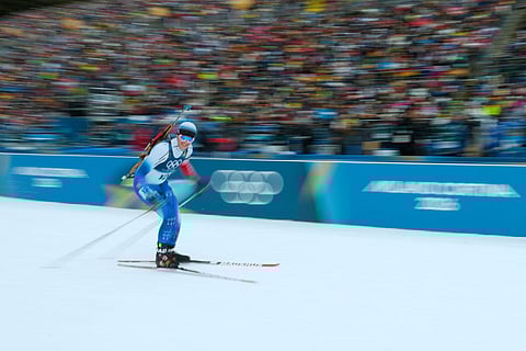 Sondre Slettemark, of Denmark, competes in the men's 20-kilometer individual biathlon race at the 2026 Winter Olympics in Anterselva, Italy.