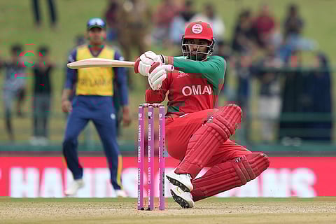 Oman's Wasim Ali plays a shot during the T20 World Cup cricket match between Oman and Sri Lanka in Pallekele, Sri Lanka.