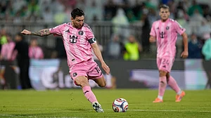 | Photo: AP/Fernando Vergara : Inter Miami's Lionel Messi winds up to kick the ball during an international friendly soccer match against Colombia's Atletico Nacional in Medellin, Colombia, Saturday, Jan. 31, 2026.