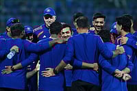 India Vs Namibia, ICC T20 World Cup 2026: See Best Photos From Delhi's Arun Jaitley Stadium | Photo: AP/Manish Swarup : India's head coach Gautam Gambhir, center, smiles as he briefs the players before the start of the T20 World Cup cricket match between India and Namibia in New Delhi.