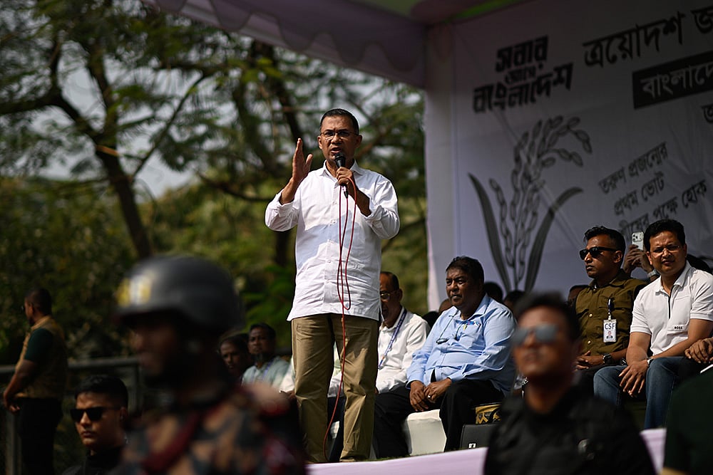 Bangladesh Nationalist Party (BNP) Chairperson Tarique Rahman speaks to his supporters during an election rally on the last day of the election campaign, in Dhaka, Bangladesh. - | Photo: AP/Mahmud Hossain Opu