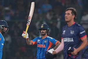 | Photo: AP/Manish Swarup : India's Ishan Kishan celebrates his fifty runs during the T20 World Cup cricket match between India and Namibia in New Delhi.