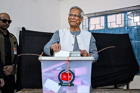 In this image posted on Feb. 12, 2026, Bangladesh Chief Adviser Muhammad Yunus casts his ballot during voting in the country's 13th parliamentary elections, in Dhaka, Bangladesh. 