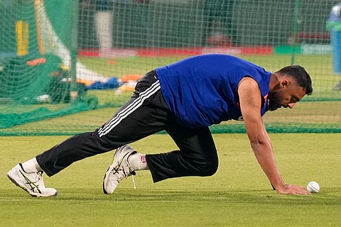 India's Varun Chakravarthy during a practice session ahead of an ICC Men's T20 World Cup 2026 cricket match between India and Namibia, at the Arun Jaitley Stadium, in New Delhi.