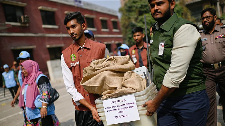 Election officials and security personnel transport ballot boxes and voting materials to polling centers ahead of Thursday's national parliamentary election, in Dhaka, Bangladesh, Wednesday, Feb. 11, 2026 - MAHMUD HOSSAIN OPU