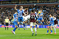 | Photo: Cody Froggatt/PA via AP : Aston Villa's Tyrone Mings scores their side's first goal of the game during their English Premier League soccer match against Brighton in Birmingham, England.