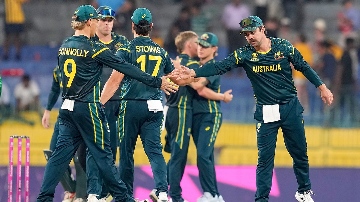 Australia's captain Travis Head, right, celebrates with teammates after Australia won the T20 World Cup cricket match against Ireland in Colombo, Sri Lanka, Wednesday, Feb. 11, 2026.  - | Photo: AP/Eranga Jayawardena