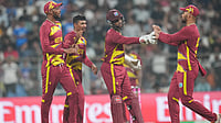 West Indies Vs England, ICC T20 World Cup 2026: Who Won Yesterday's WI V ENG Match? | Photo: AP/Rafiq Maqbool : West Indies' Gudakesh Motie, second from left, celebrates with teammates the wicket of England's Jacob Bethell during the T20 World Cup cricket match between England and West Indies in Mumbai, India, Wednesday, Feb. 11, 2026.
