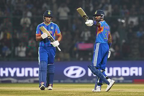 India's Shivam Dube applauds as batting partner Hardik Pandya celebrates his fifty runs during the T20 World Cup cricket match between India and Namibia in New Delhi.