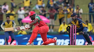 AP : Mohammad Nadeem bats during the ICC T20 World Cup 2026 match between Oman and Sri Lanka in Pallekele.