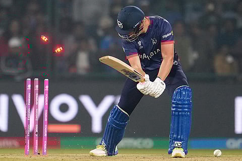 Namibia's Ruben Trumpelmann reacts after getting bowled out by India's Jasprit Bumrah during the T20 World Cup cricket match between India and Namibia in New Delhi.