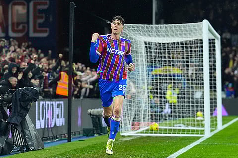 Crystal Palace's Jorgen Strand Larsen celebrates after scoring their side's first goal of the game during their English Premier League soccer match against Burnley in London. 