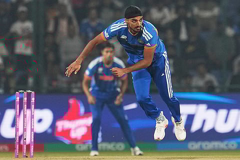 India's Arshdeep Singh bowls a delivery during the T20 World Cup cricket match between India and Namibia in New Delhi.