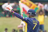 | Photo: AP/Eranga Jayawardena : Sri Lanka's captain Dasun Shanaka celebrates his fifty runs during the T20 World Cup cricket match between Oman and Sri Lanka in Pallekele, Sri Lanka, Thursday, Feb. 12, 2026.
