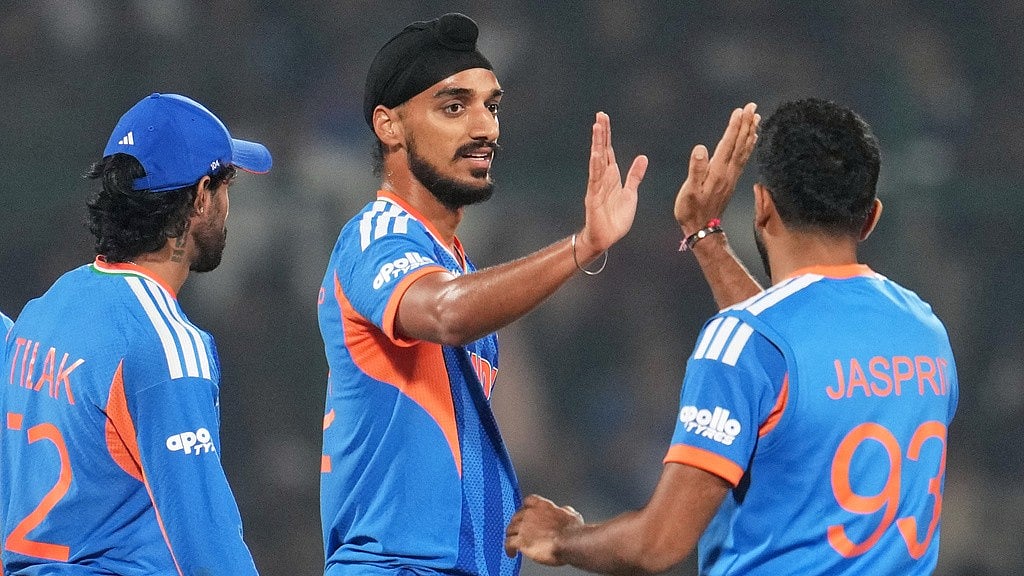 India's Arshdeep Singh, centre, celebrates with teammate Jasprit Bumrah the wicket of Namibia's Jan Frylinck during the T20 World Cup match between India and Namibia in New Delhi. - Photo: AP