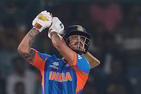 India's Ishan Kishan hits a six during the T20 World Cup cricket match between India and Namibia in New Delhi.