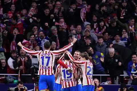 Atletico Madrid's team players celebrate after Julian Alvarez scored his side's fourth goal during the Copa del Rey semifinal first leg soccer match between Atletico Madrid and Barcelona in Madrid, Spain.