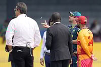 | Photo: AP/Eranga Jayawardena : Australia's captain Travis Head, second right, toss the coin as Zimbabwe's captain Sikandar Raza, right, watch it before the starts of the T20 World Cup cricket match between Australia and Zimbabwe in Colombo, Sri Lanka.
