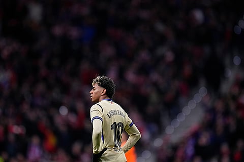 Barcelona's Lamine Yamal reacts during the Copa del Rey semifinal first leg soccer match between Atletico Madrid and Barcelona in Madrid, Spain.