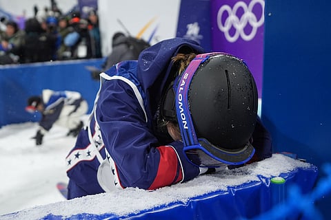 United States' Maddie Mastro reacts after her run during the women's snowboarding halfpipe finals at the 2026 Winter Olympics, in Livigno, Italy.