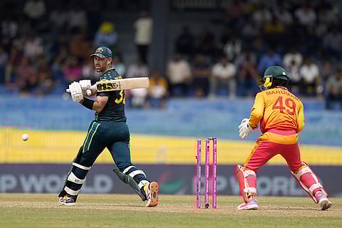 Australia's Glenn Maxwell bowled out by Zimbabwe's Ryan Burl during the T20 World Cup cricket match between Australia and Zimbabwe in Colombo, Sri Lanka.
