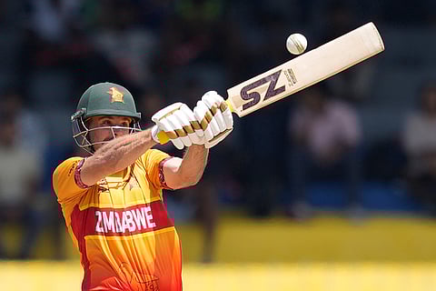 Zimbabwe's Ryan Burl plays a shot during the T20 World Cup cricket match between Australia and Zimbabwe in Colombo, Sri Lanka.