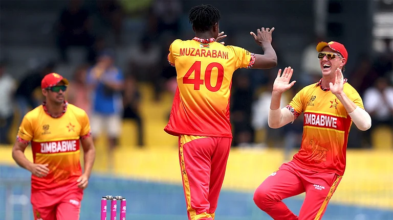 Zimbabwe cricketers celebrating wickets against Australia in ICC T20 World Cup 2026 Group B clash. - ZimCricketv/X