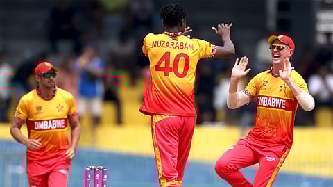 Zimbabwe cricketers celebrating wickets against Australia in ICC T20 World Cup 2026 Group B clash.