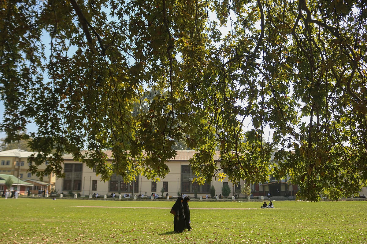  College girls walk on a playground in Srinagar, Jammu and Kashmir, on September 30, 2025. SRINAGAR - MAGO / NurPhoto