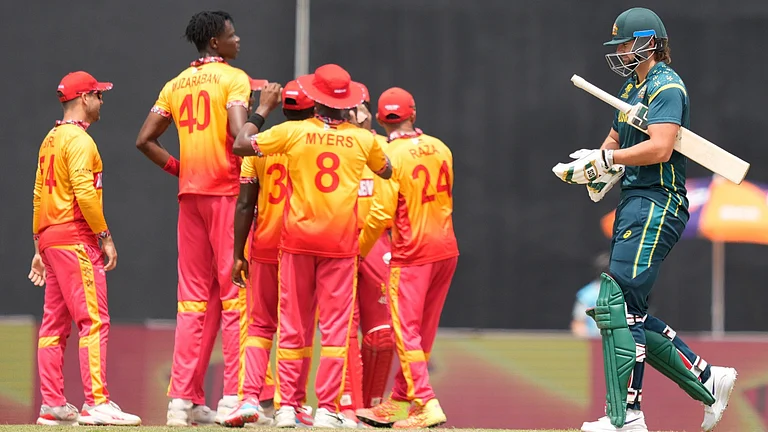 Australia's Tim David leaves the ground after losing his wicket during the ICC T20 World Cup 2026 Group B match between Australia and Zimbabwe in Colombo. - AP Photo