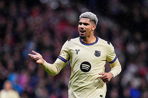 Barcelona's Ronald Araujo reacts during the Copa del Rey semifinal first leg soccer match between Atletico Madrid and Barcelona in Madrid, Spain.