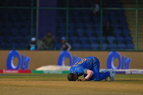 United Arab Emirates' Junaid Siddique celebrates the wicket of Canada's Saad Bin Zafar during the T20 World Cup cricket match between Canada and United Arab Emirates in New Delhi.